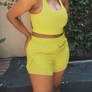 Girlfriend Collective chartreuse trail shorts